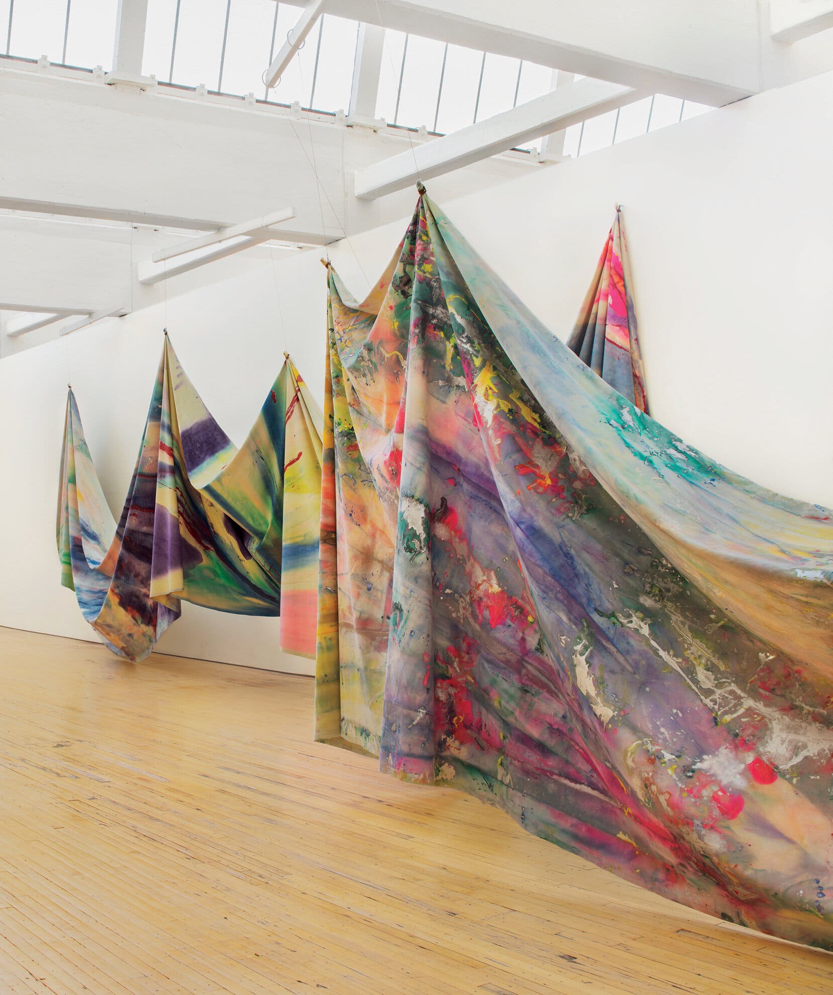 The paintings of Sam Gilliam’s 1968 “Double Merge,” at Dia:Beacon in New York.Credit...© Sam Gilliam/Artists Rights Society (ARS), New York. Photo: Bill Jacobson Studio, New York, courtesy of the Dia Art Foundation