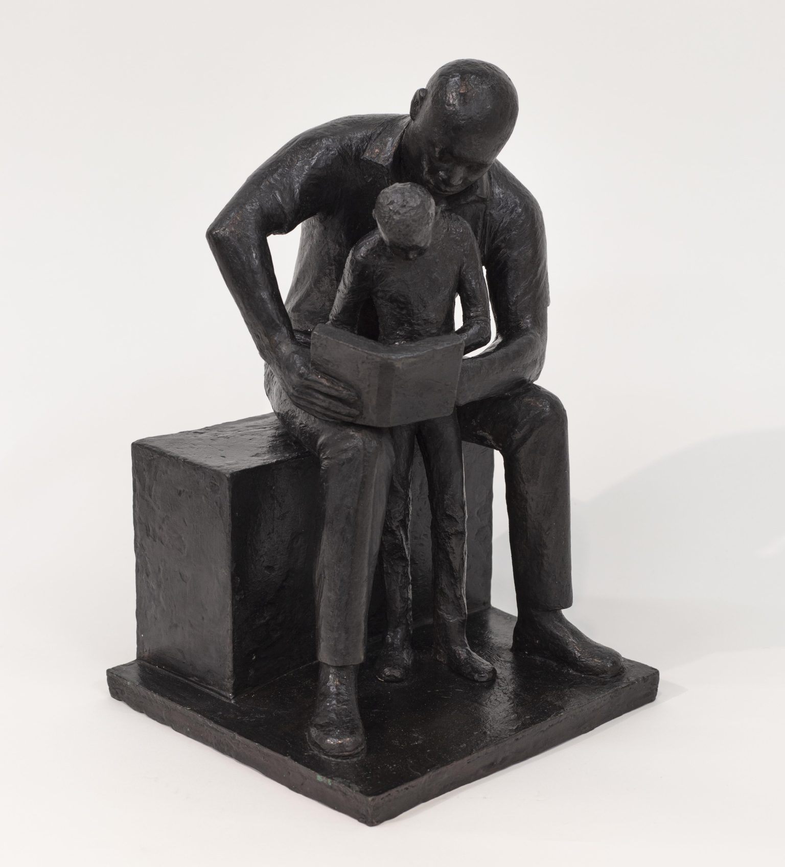 John Wilson Father and Child Reading, 1985 Bronze with brown patina 14 1/2 x 9 1/4 x 8 3/4 inches (36.8 x 23.5 x 22.2 cm) Edition of 10
